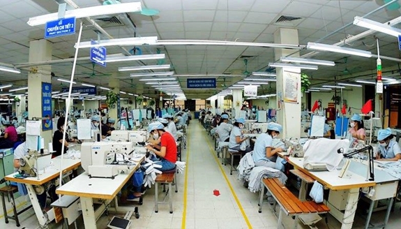 Hoạt động sản xuất tại Tập đoàn Dệt may Việt Nam. Ảnh: BẢO HÂN